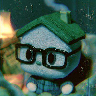 The original Ozzyfication picture: a felt house with a green roof and thick black glasses